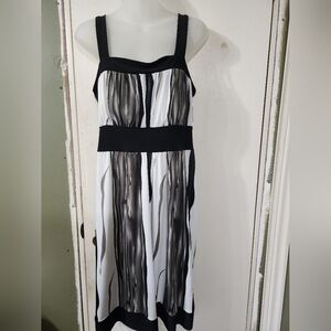 NWOT- Super cute and perfect for summer!! NWD dress, Sz Med but very forgiving!